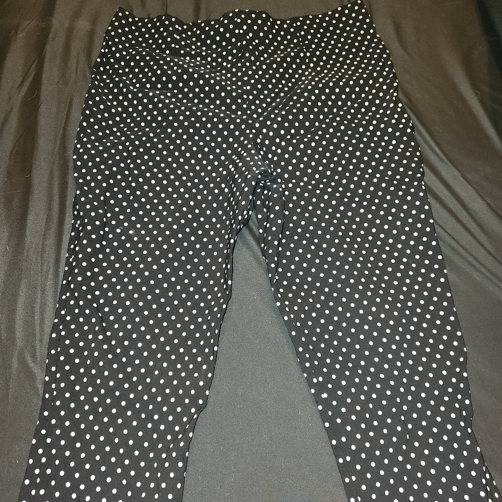 Black with white polka dots capri pants.